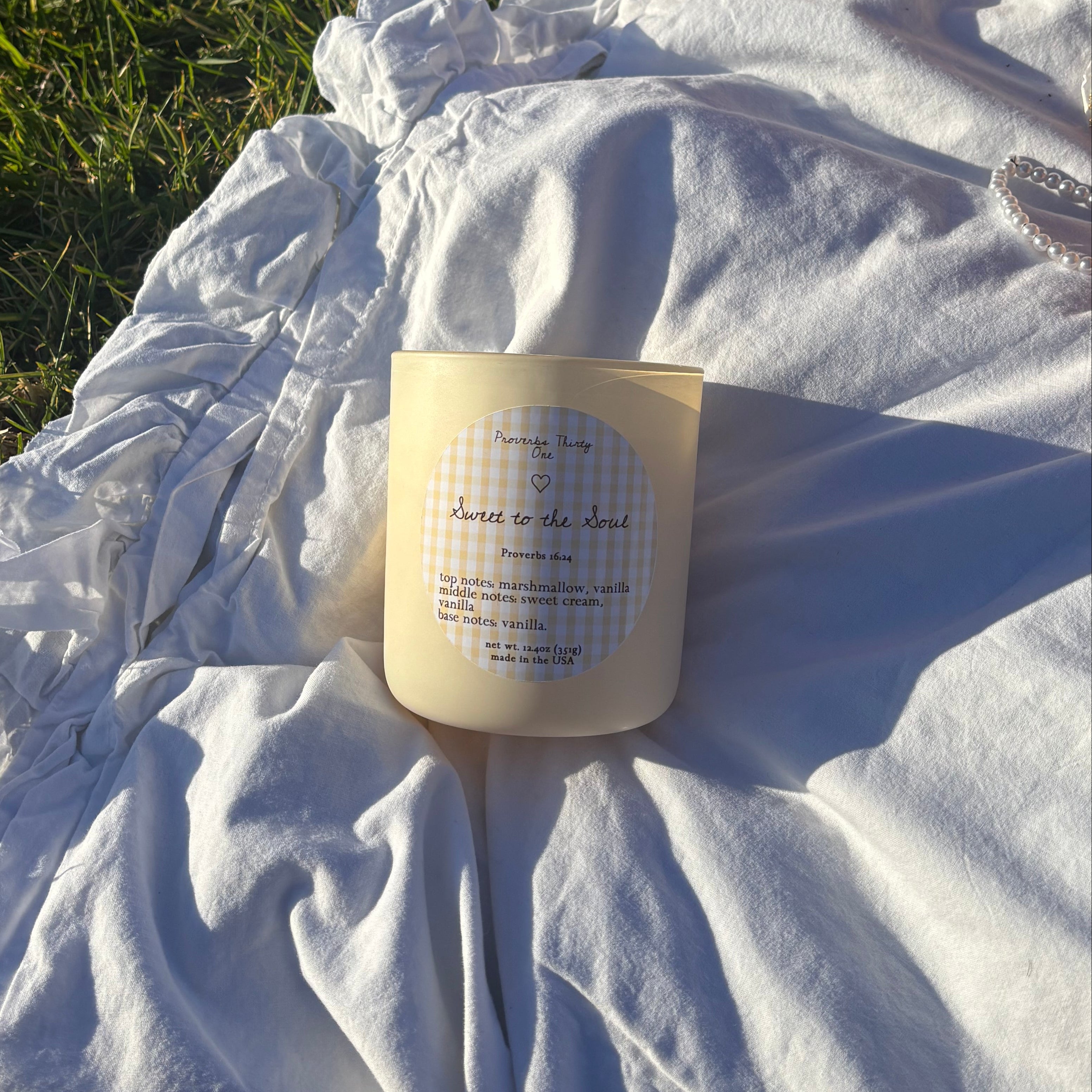 buttercup and gingham vanilla marshmallow candle that says sweet to the soul. 